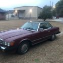 1988 Mercedes 560SL Burgundy 2 dr convertible