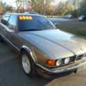 1989 BMW 750i, V-12, bronzit, red leather, runs and drives very well.