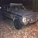 1989 jeep wagoneer -w new tires and set of studded tires