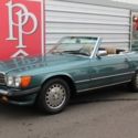 1989 Mercedes-Benz 560SL Roadster, Blue Green Poly on cream beige