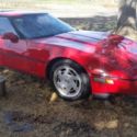 1989 red hatchback corvette