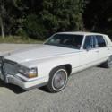 1990 Cadillac Brougham  41,804 Miles White  5.0 L Automatic