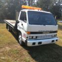 1990 Isuzu NPR Diesel engine flat bed towing