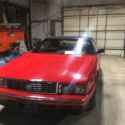 1990 Red Cadillac Allante Convertable in great shape with car cover