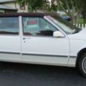 1991 CADILLAC DeVILLE WHITE EXTERIOR W/ REAR BURGUNDY CLOTH TOP COLLECTORS ITEM