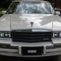 1991 Cadillac Seville in excellent condition, red interior, digital dash.