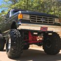 1991 Ford F-150 lifted on 44s