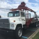 1991 Ford LNT 8000F Conventional Tandem Flatbed with IMT Material Boom