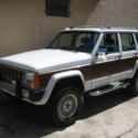 1991 JEEP CHEROKEE 6CYL 4X4 4D BRIARWOOD EDITION 4WD WHITE/BURGUNDY LEATHER.