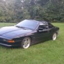 1992 BMW 850i. Black on black, V-12 Auto. This car is a timeless classic.  Ohio.