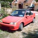 1992 Geo Metro LSI Convertible Red with black top, automatic with air, 50K miles