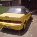 1992 (yellow) GEO Metro Convertible   (SALVAGE – Front end damaged)