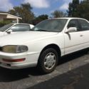 1993 toyota camry le 4 cylinder white 4 door.