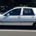 1994 Buick Roadmaster sedan, white, 177K, runs well, good to restore or part out