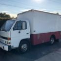 1994 Isuzu NPR diesel cargo plumbing service box truck