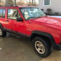 1994 Jeep Cherokee 2-door Sport with front end damage