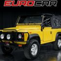 1994 Land Rover Defender 90 2dr 90 3.9L NA V8 overhead valves (OHV) 16V Yellow