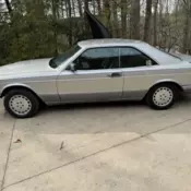 2-door coupe, pearl gray with red/blue accent stripes - Sunroof with no B-pillar