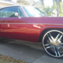 2 door fastback, candy apple red, chromed motor, front disk brakes, black interi