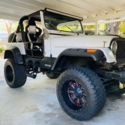 350 v8, power steering, 35&#034; tires, 20&#034; wheels, rhino lining