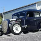 354 Hemi, Tremec 5-speed manual. Well-documented street rod. Custom interior.