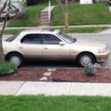 4 Door Sedan Tan Automatic FWD V8 Gold Tan 8 Cyl 92