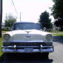 4 door sedan w/ continental kit. two tone (teal and pearl) standard transmission