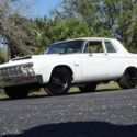426 Max Wedge built to Stage III specs. 4-speed manual, 3.91 Posi. Bucket seats!