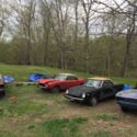 5 Fiat 124 Spiders and barn stall full of used parts