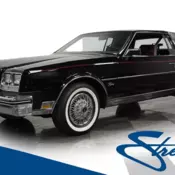 5.0L V8, 4-speed auto, front power disc brakes, self-leveling rear shocks, black