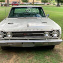 67 GTX bucket seats, white interior with black carpeting