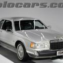 7,700 actual miles. Pristine, all original. Top of the line Bill Blass. 1 owner!