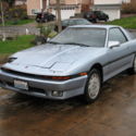 '86 Blue Toyota Supra, 3.0 liter (not turbo), 6 cylinder engine, automatic