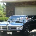 A 1967 Pontiac Firebird Convertible 326 4 barrel with a 400 Hood with Rally IIs