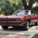 A 1968 Pontiac GTO with yarn to spin