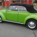 A fun convertible Beetle is finished in a bright green over black