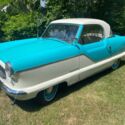 A restored 1959 Nash Metropolitan. Garage kept.
