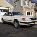 Audi 100 CS Quattro 5 speed, 136K miles. Pearl White over Platinum Leather
