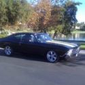 Beautiful restoration - custom paint chip foose rim tires, 350 engine,