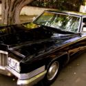 Black 1970 Cadillac Coupe De Ville / Black and White Interior