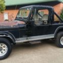 Black 1982 Jeep CJ-8 Scrambler Laredo.