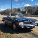 BLACK Mercedes SL380 1981 With a new soft roof!