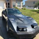 Black metallic Corvette, Glass T-Top. Titile provided upon sale.