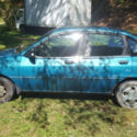 Blue Base 4-door with hatchback, good condition considering age, drives great.