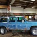 Blue Chevrolet Suburban with 83,980 Miles available now!
