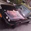 BMW 1990 325i Black Convertible with a 5-lug e30 M3 suspension swap.