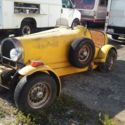 Bugatti kit car.  True. Barn find..