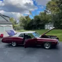Burgandy exterior Black exterior 95,000 miles runs and drives great