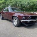 Burgundy Ford Mustang with 0 Miles available now!
