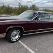 Burgundy Lincoln Continental with 0 Miles available now!
